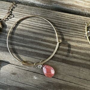 Elegant Gold Bangle Bracelet with Pink Charm